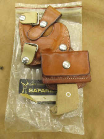 Safarilandcuffanddump.JPG (54742 bytes)